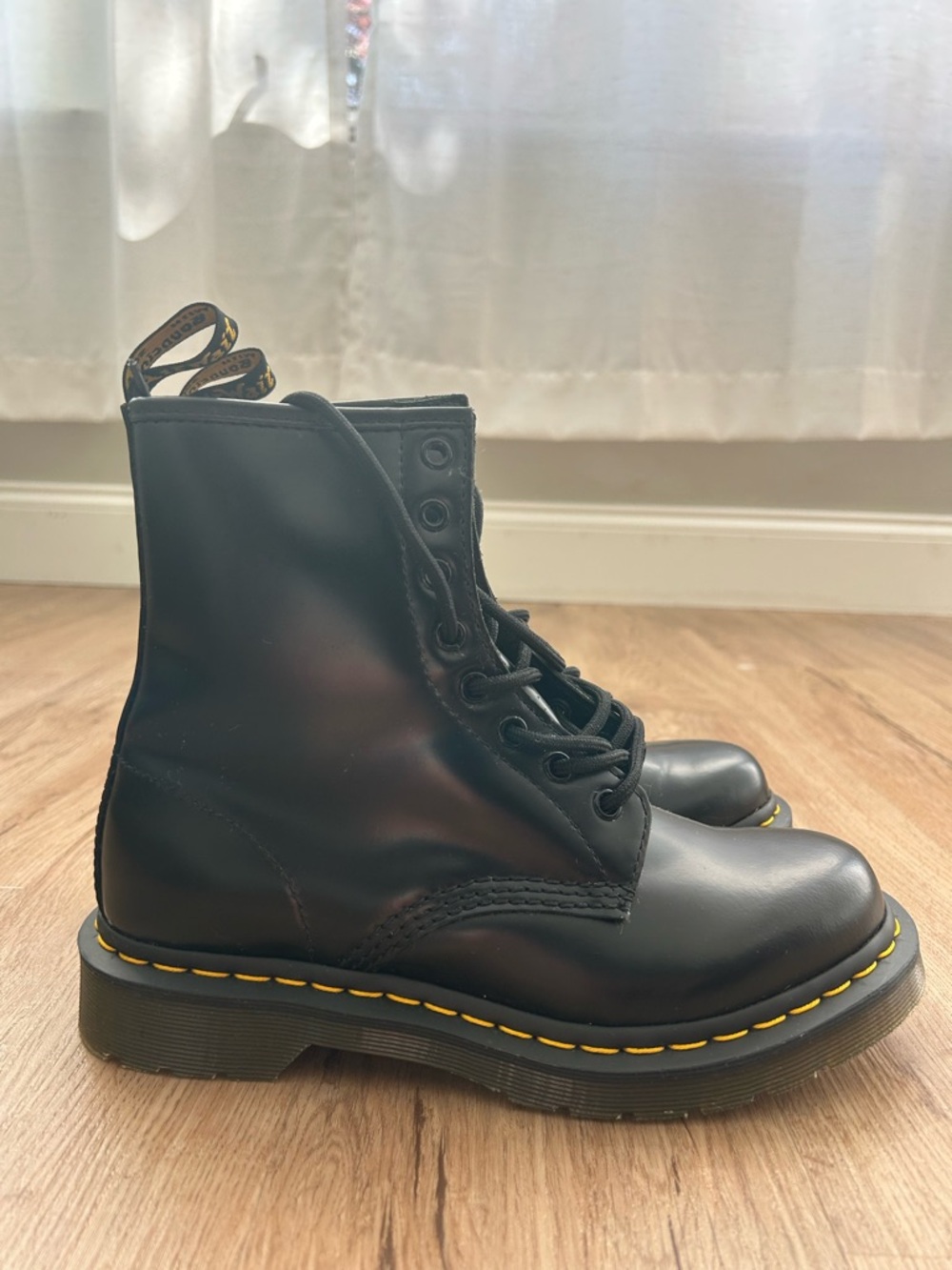 Dr. Martens Black Leather Boots with Yellow Accents